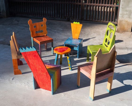 playful children’s drawings become colorful handmade chairs in cambodia